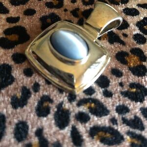 Elegant Silver Pendant with Greyish Blue Stone